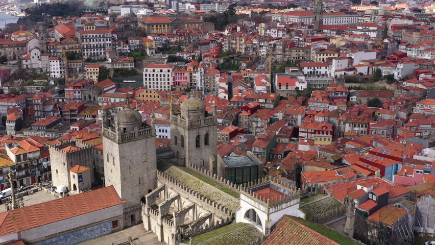 Porto, Portugal: Aerial view of the center of a famous historical European city and Porto Cathedral. 4K Royalty-Free Stock Footage #1109190901
