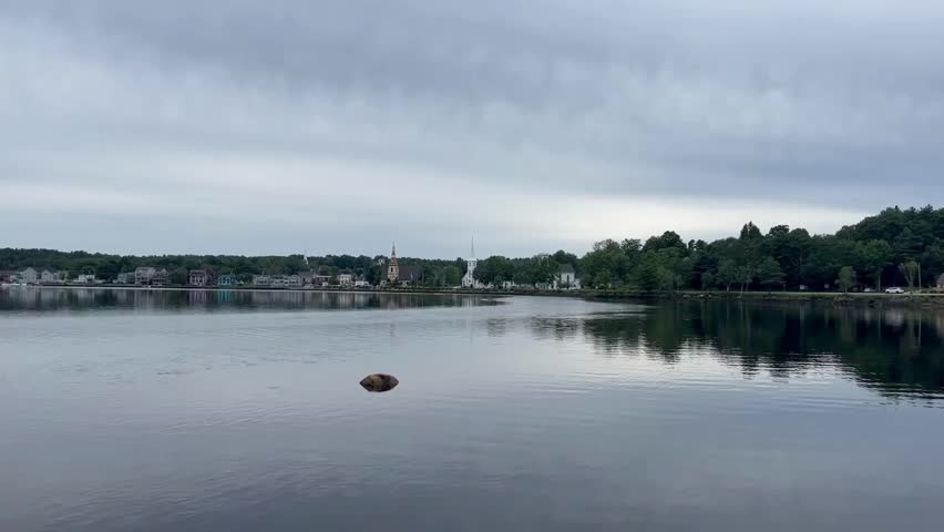 Looking across the calm water to the famous 3 churches along Mahone Bay.
