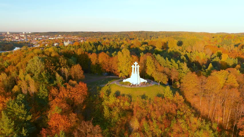 Aerial view of the Three Crosses monument overlooking Vilnius Old Town. Vilnius landscape with the Hill of Three Crosses, located in Kalnai Park, Vilnius, Lithuania Royalty-Free Stock Footage #1109201385