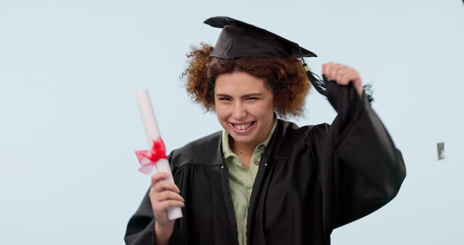 Graduate, celebration and woman in studio with confetti, excited, and cheer for success on blue background. University, college and portrait of student fist pump for education, certificate and award