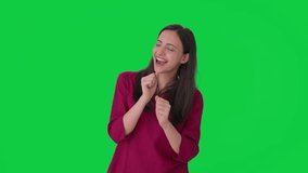 Happy Indian girl dancing and enjoying Green screen - Powered by Shutterstock - Get 15% off with code: PIKWIZARD15