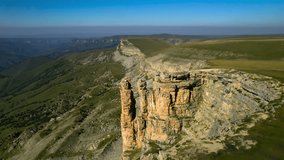 Beautiful aerial view of a mountain plateau with high cliffs. Landscape and nature of the North Caucasus