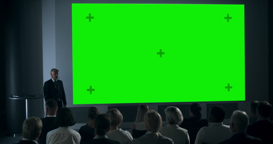 Corporate Event: Caucasian Male Tech CEO Giving Presentation On Green Screen Chromakey Projector Display To Colleagues In Conference Room Of Startup Office. Man Talking About Business Objectives. | Shutterstock HD Video #1109215791