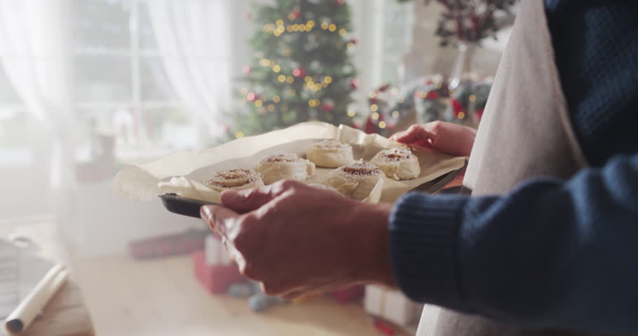 Happy Family During Christmas: Slow Motion Portrait of Little Cute Girl Learning How to Make Cookies and Celebrating her Achievement with her Parents. Cute Family Preparing Together for Holiday Dinner Royalty-Free Stock Footage #1109217921