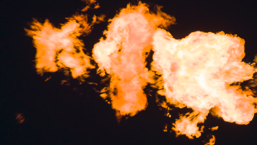 Associated Gas Flaring Process. A powerful pillar of bright flame with swirling fiery tongues in the air on a black background. Slow Motion 120 fps | Shutterstock HD Video #1109218493
