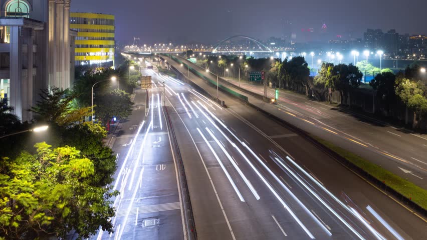 Time lapse of traffic on a busy road in Taipei Taiwan at night | Shutterstock HD Video #1109223129