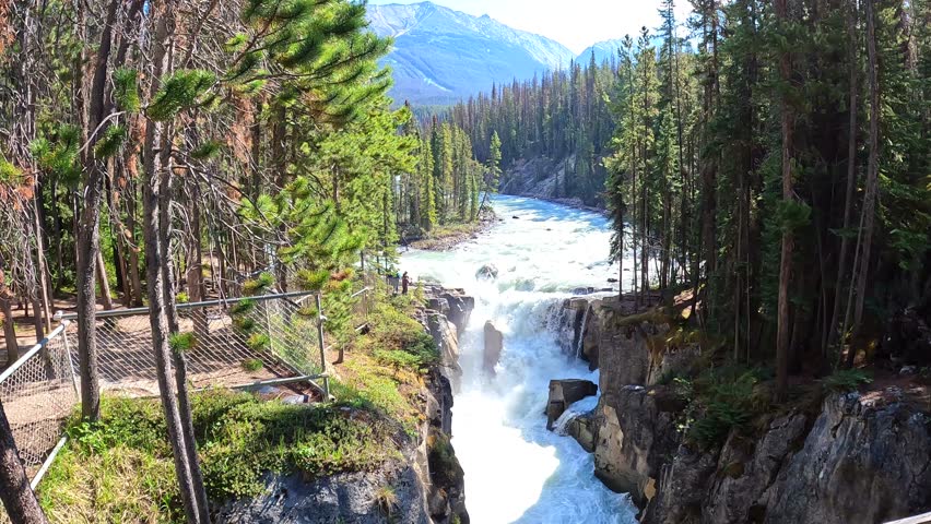 Sunwapta Falls along the Ice Fields Parkway in Jasper National Park in Canada on a beautiful day.
