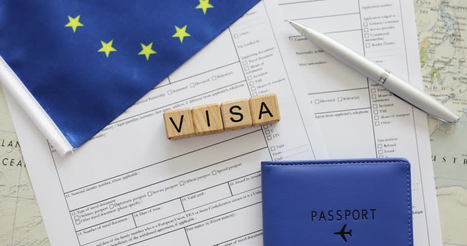 Visa application form for immigration to European Union and pen on table. closeup. Obtaining Schengen visa Royalty-Free Stock Footage #1109226131