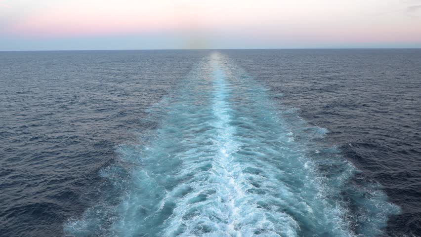 Full view of a ship sailing trail in the sea - Ship's wake