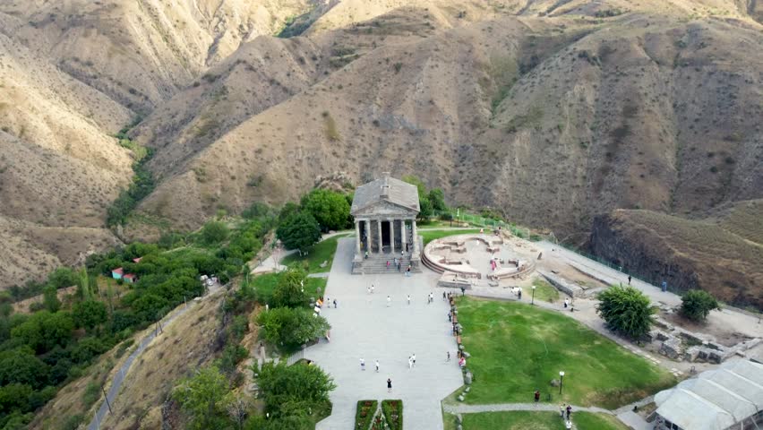 Aerial drone footage of the historic Garni Temple in Armenia, showcasing its architectural beauty amidst a breathtaking landscape Royalty-Free Stock Footage #1109238031