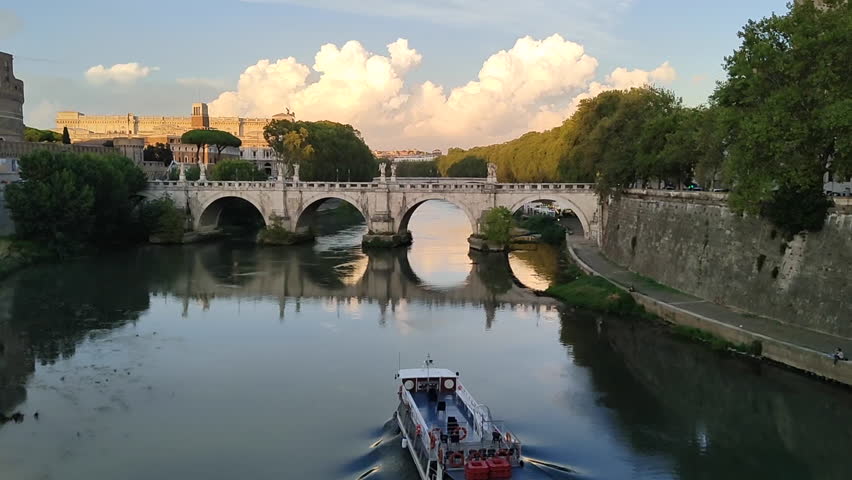  A ship gracefully sails upstream on the Tiber River in Rome, Italy | Shutterstock HD Video #1109238511
