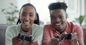 Black people, couple playing video game and fun together with bonding, technology and streaming on a date. Happy, controller and competition with laughter, healthy relationship and challenge at home