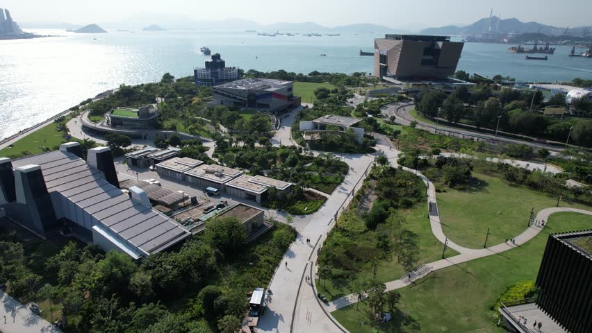 Drone Aerial Skyview in Austin Jordan Tsim Sha Tsui West Kowloon high speed railway station exterior, near a densely residential and commercial downtown
