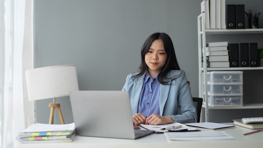 Attractive Asian business woman Relax from work after sitting for a long time. in order not to exceed the office syndrome at the office Royalty-Free Stock Footage #1109245197