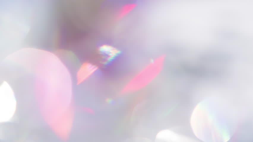Iridescent Glare Gracefully Shimmers. Loop. The light passes through the facets of a slowly rotating diamond and creates repetitive sparkling highlights and rainbow colors | Shutterstock HD Video #1109257127