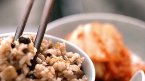 Close-Up of Steamed Brown Rice with Beans in 4K Video