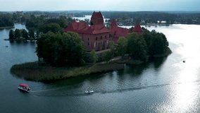 Aerial 4K footage of Trakai castle. Medieval gothic Island castle, located in Galve lake. Drone video from above