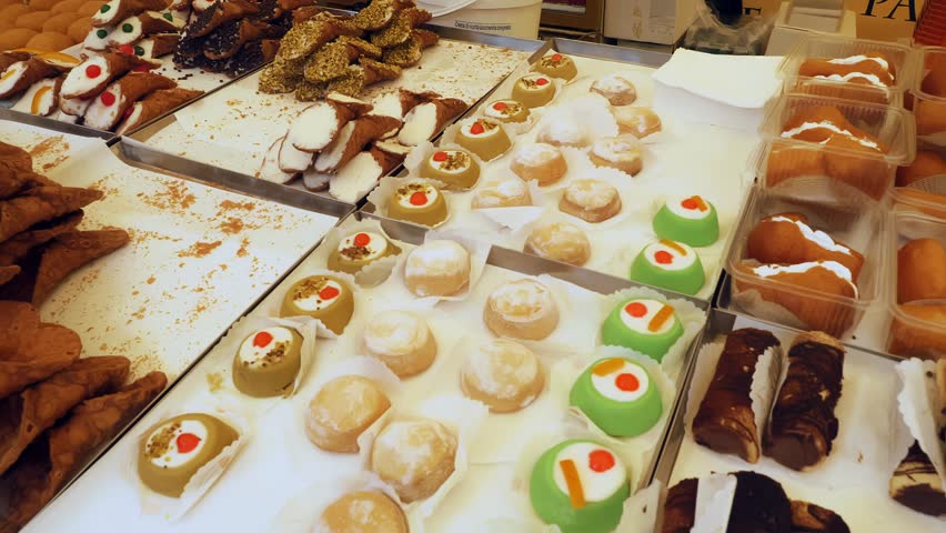 confectionery. bakery products. sweet pastries. close-up. Traditional sweet Italian pastries. sweet, luscious desserts are on showcase in patisserie. 