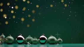 christmas ball and bulb light decoration in green background