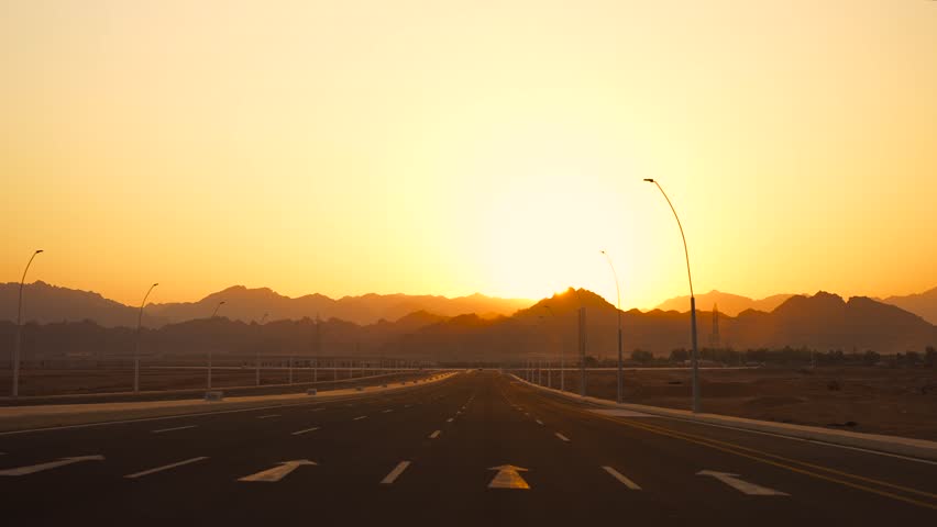 Motion by multi lane highway road to the the mountains at sunset. Sharm El Sheikh, Egypt Royalty-Free Stock Footage #1109265687