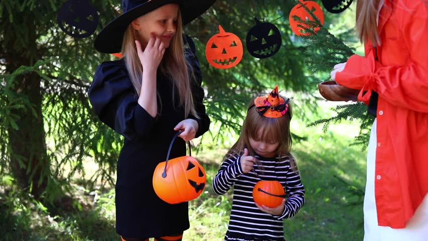 Girls dressed up as witches for Halloween, Funny video, Kids asking for Halloween candy, go trick or treating