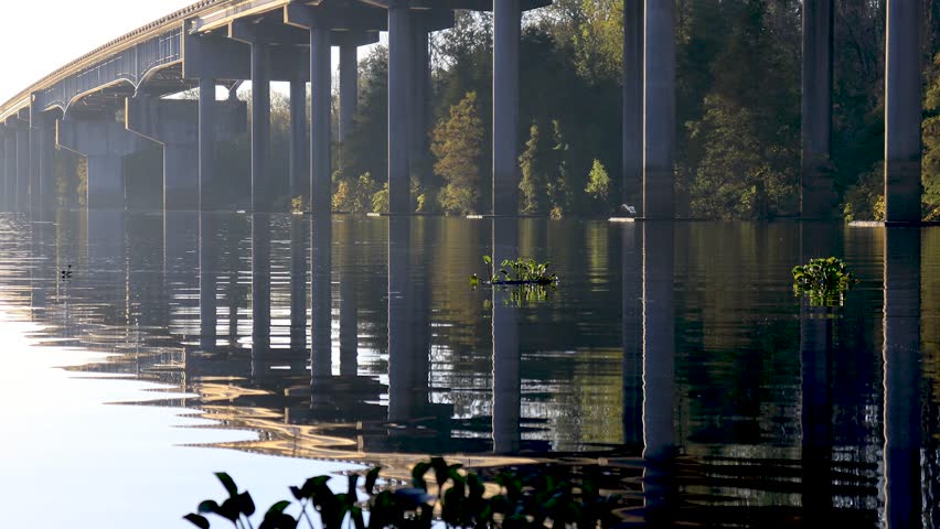 Atchafalaya swamp bridge at sunset in Louisiana.