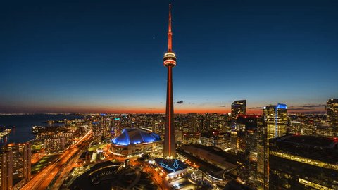 Day to night timelapse view of Toronto cityscape in Toronto, Ontario, Canada, establishing shot, business and finance concept, zoom in. Stockvideo