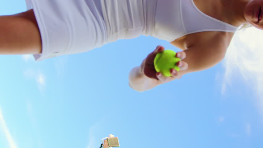 Active sportswoman playing tennis in tennis court Royalty-Free Stock Footage #1109290611