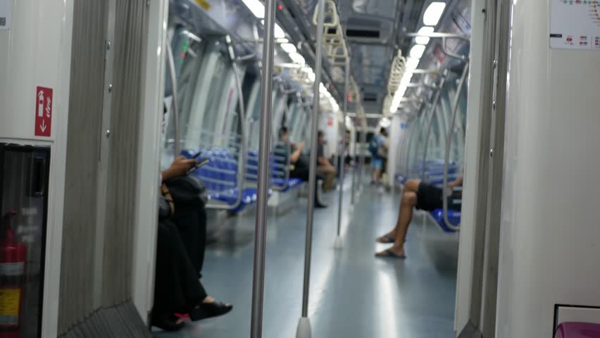 out of focus blurred view inside subway train commuter car with many passengers in crowded rush hour, metro city life transportation background,interior subway train car Royalty-Free Stock Footage #1109294727