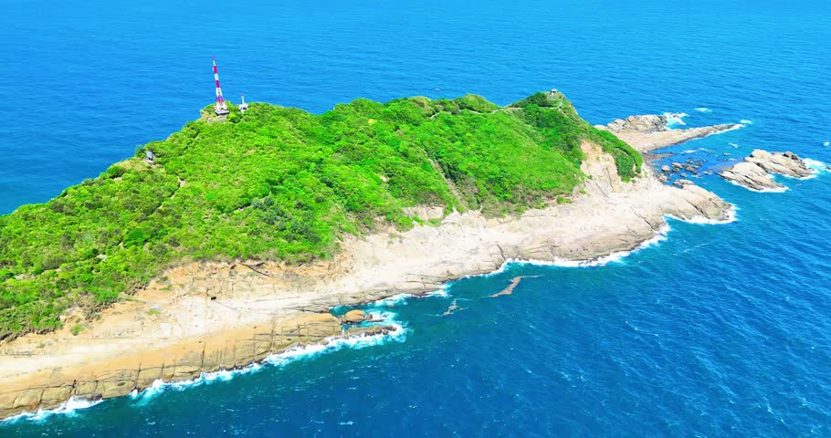 Isolated Rock Island in the Middle of the Sea