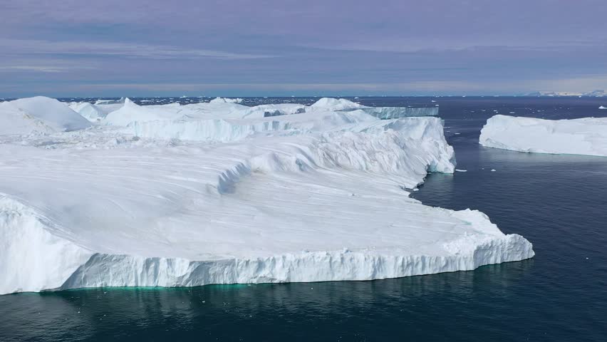 Antarctica Nature. Icebergs. Climate and weather change. Global warming. Antarctica melting iceberg. Aerial view. Arctic ice nature landscape. Global warming and climate change concept. Top drone shot
