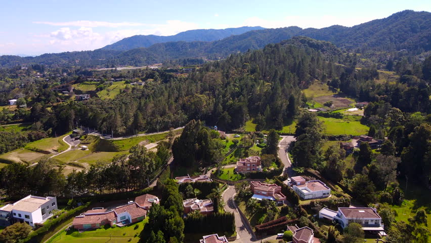 Drone video clip from the top of the palms in Envigado, near Medellín, Colombia.
