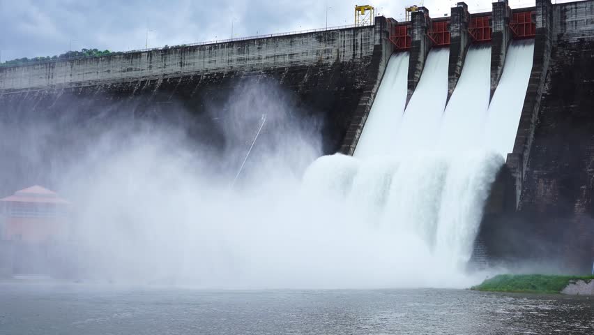 Hydroelectric dam Floodgate with flowing water through gate and Open the springway Khun Dan Prakan Chon Dam in nakhon nayok Thailand Royalty-Free Stock Footage #1109303289