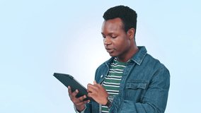 Man, tablet and communicate with happiness, blue background and casual clothing in gen z style. Black person, video game selection and technology on social media for fun, smiling or online learning