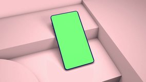 Mobile phone mockup video with green screen laying on geometric square blocks and shapes in light beige coloured background. 3d render animation