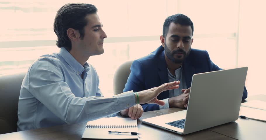 Manager showing on-line presentation to client, share information, explain data, selling company services make commercial offer to customer during formal meeting in office. Apprenticeship, sales, tech | Shutterstock HD Video #1109316743