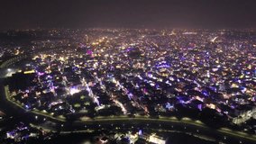 aerial drone hyperlapse shot showing indian city jaipur delhi gurgaon rajasthan during diwali makar sankranti with fireworks shooting up and colorful lights on houses - Powered by Shutterstock - Get 15% off with code: PIKWIZARD15