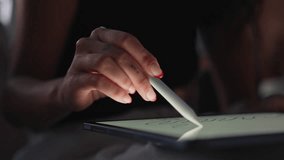 Woman Hand Holding Digital Pen and Using Tablet Computer for Artist Work. Remote Homework of School Girl Drawing Images by White Pencil on Screen. Young Person Sketching Art Notes at Evening Indoors - Powered by Shutterstock - Get 15% off with code: PIKWIZARD15