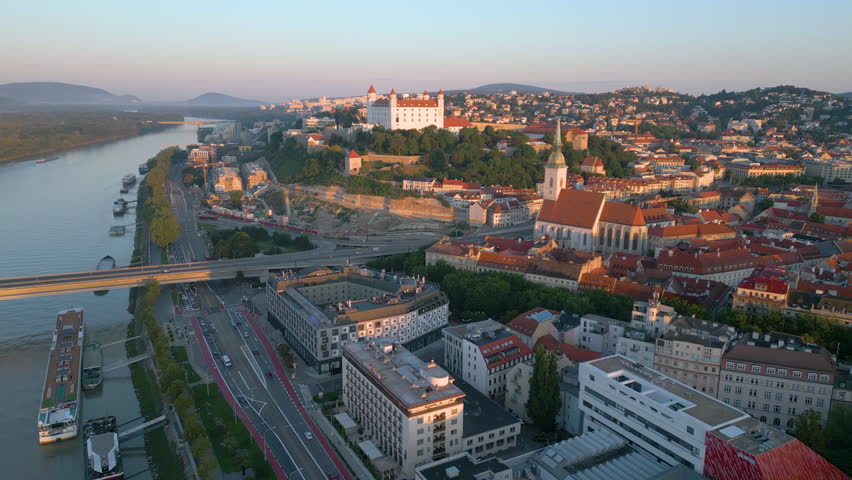 Bratislava city skyline aerial view of downtown bratislava slovakia castle and old town view fly over river and bridge.