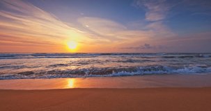 Tropical summer beach, sunrise over sea horizon, waves and beach shore video