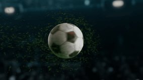 A soccer ball floats in the air as grass particles fly around.football ball on a blurry stadium in the background. - Powered by Shutterstock - Get 15% off with code: PIKWIZARD15