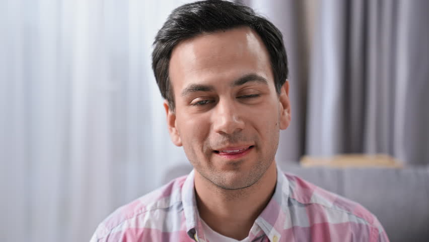 Silly bursting laugh. Happy 30s person head shot. Young adult man look camera. One nice guy joking. Fun male face close up. Joyful loud laughter. Funny hard laughing. Human portrait. Positive emotion. Royalty-Free Stock Footage #1109372821
