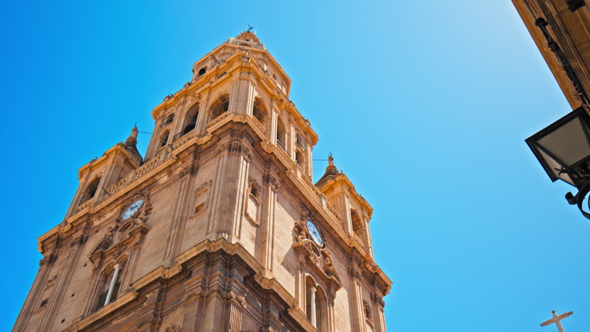 Catedral de Murcia Roman Catholic church with Baroque design and Gothic style. Beautiful Spanish Tower with a clock a famous tourist attraction in the University City of Murcia in Spain, Europe