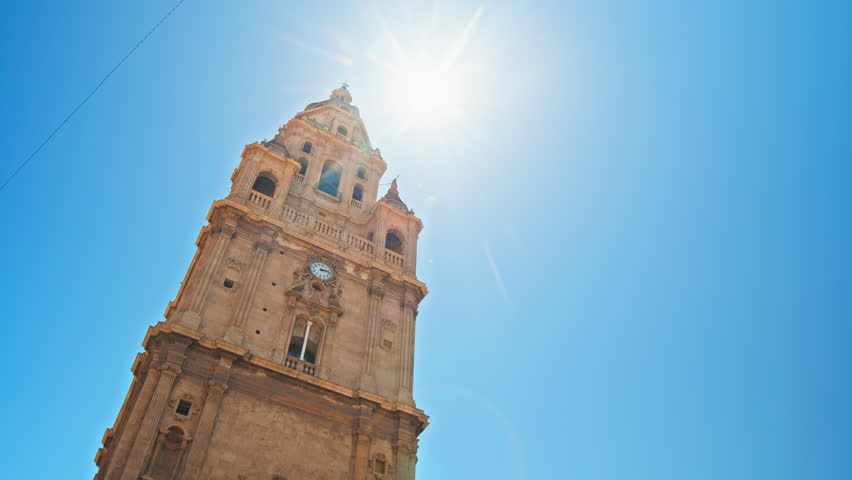 Catedral de Murcia Roman Catholic church with Baroque design and Gothic style. Beautiful Spanish Tower with a clock a famous tourist attraction in the University City of Murcia in Spain, Europe