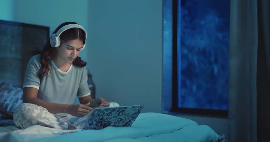 Indian frustrated young woman sitting on comfy bed making online payment using laptop having problems with card payment. Sad adult girl upset due to unsuccessful electronic insecure money transaction  Royalty-Free Stock Footage #1109397179