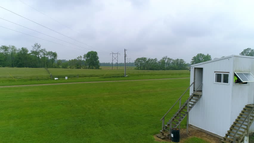Aerial Ascending Forward Over Green Landscape Against Cloudy Sky - Crawfordsville, Indiana