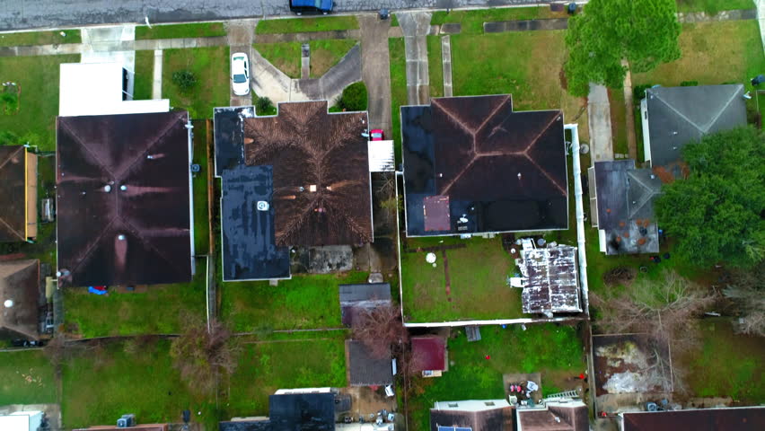 Aerial Forward Tilt Up Shot Of Houses Amidst Roads In Neighborhood Against Sky - New Orleans, Louisiana