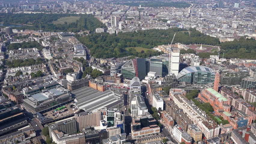 Aerial view from Victoria Station, past Westminster Cathedral and Buckingham Palace to Westminster Abbey and the Houses of Parliament, London UK.