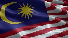 Malaysia flag video waving in wind. Realistic flag background. Close up view, perfect loop, 4K footage
