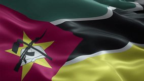 Mozambique flag video waving in wind. Realistic flag background. Close up view, perfect loop, 4K footage